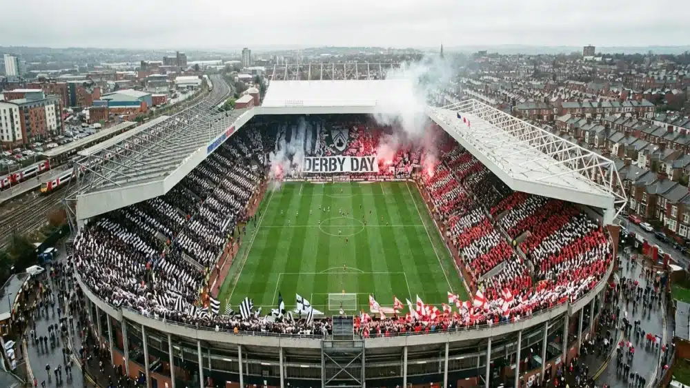 Packed football stadium for a derby match