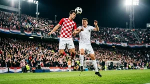 Vlasic header sends Croatia second as Ghana also reach the last 32