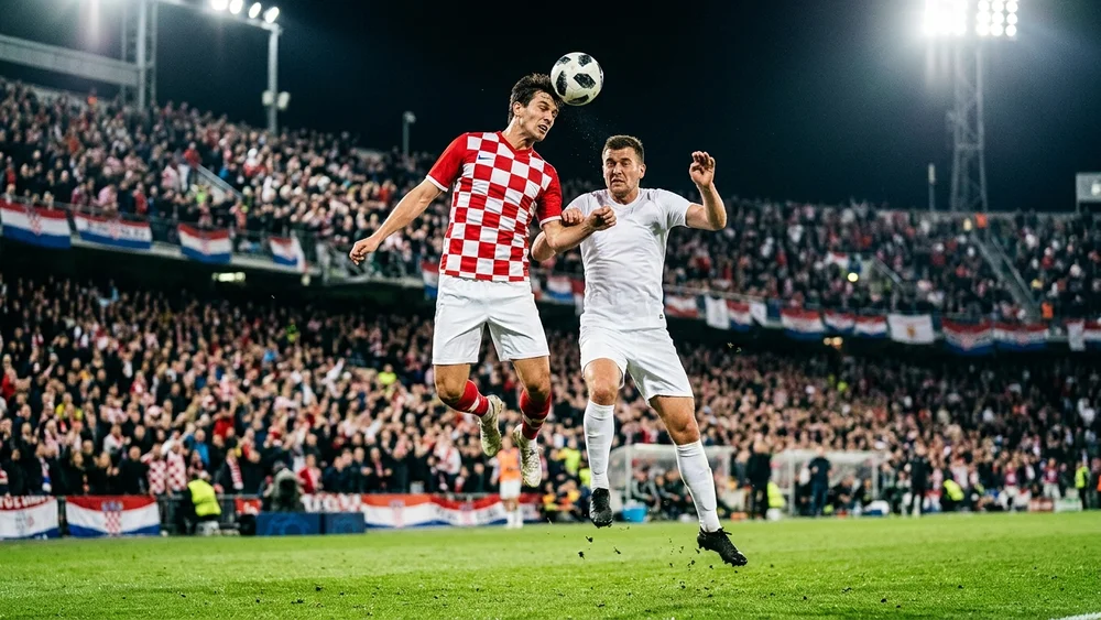 Vlasic header sends Croatia second as Ghana also reach the last 32