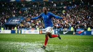 Mbappe&#8217;s double sends France into the last 32 after a storm-hit win over Iraq